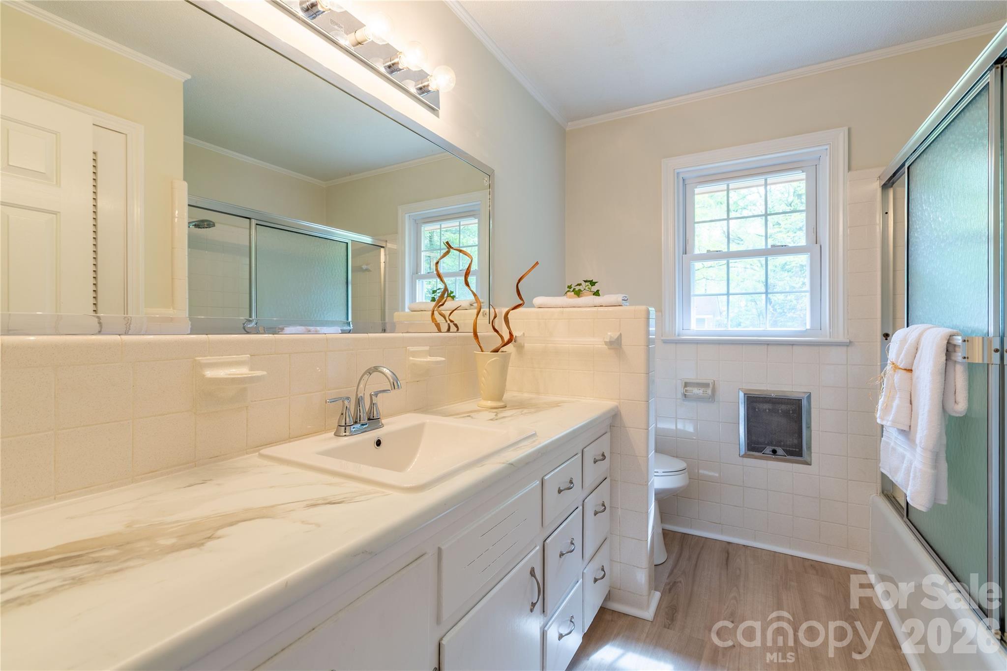 1224 Loop Road Hookerton, NC 28538 - Photo 11 of 47 a bathroom with a double vanity sink mirror and