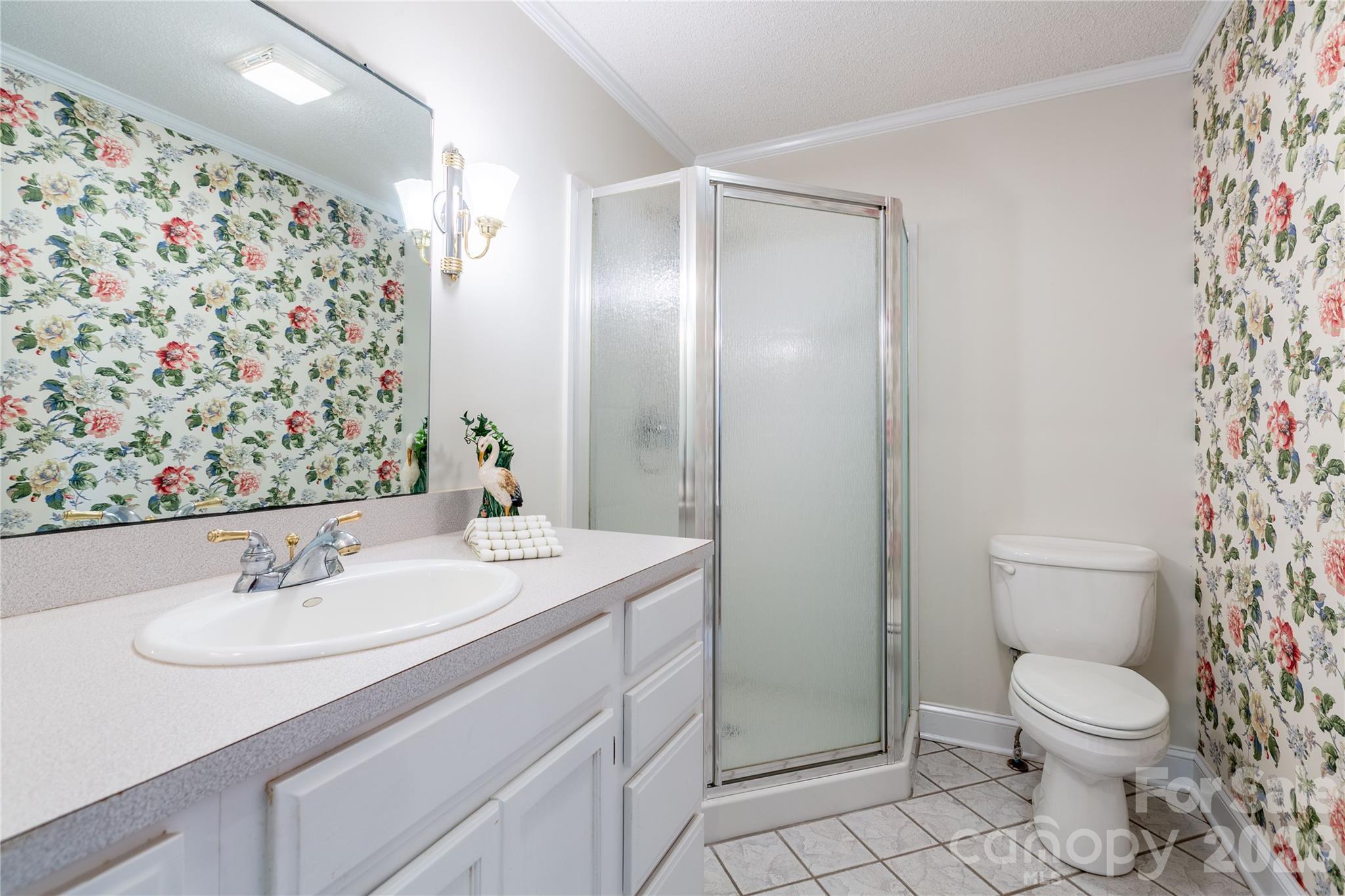 1224 Loop Road Hookerton, NC 28538 - Photo 12 of 47 a bathroom with a sink toilet and shower