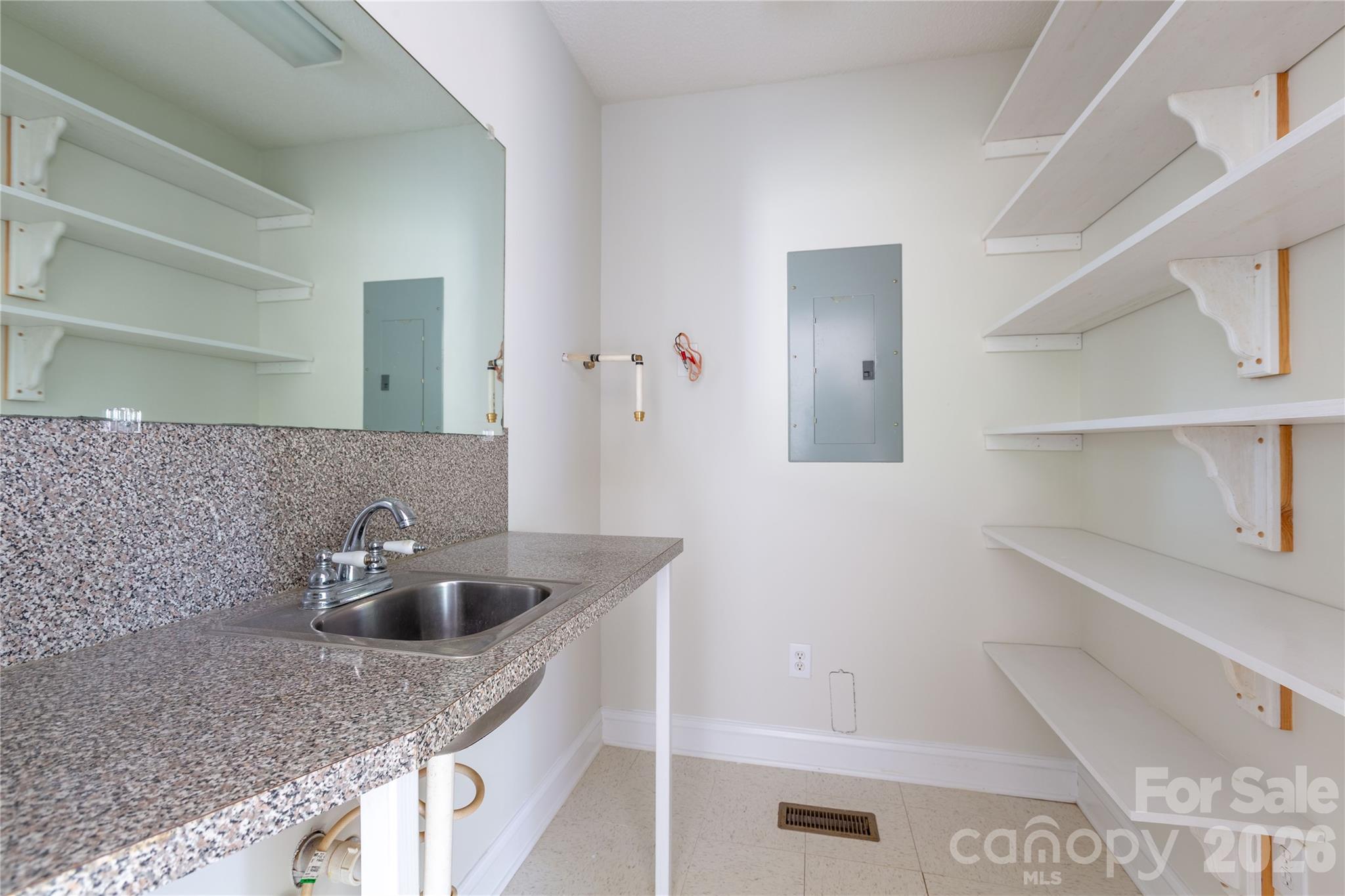1224 Loop Road Hookerton, NC 28538 - Photo 26 of 47 a kitchen with sink and cabinets