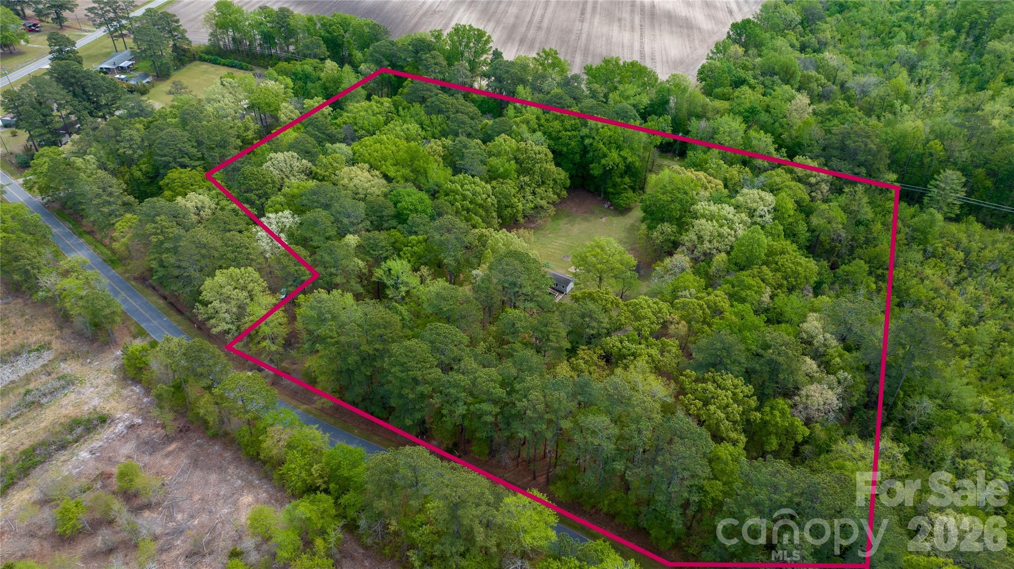 1224 Loop Road Hookerton, NC 28538 - Photo 30 of 47 a view of a flower garden in a backyard