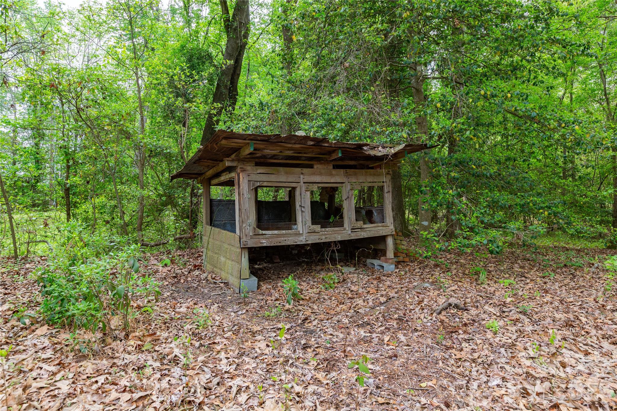 1224 Loop Road Hookerton, NC 28538 - Photo 32 of 47 a view of house with trees in the background