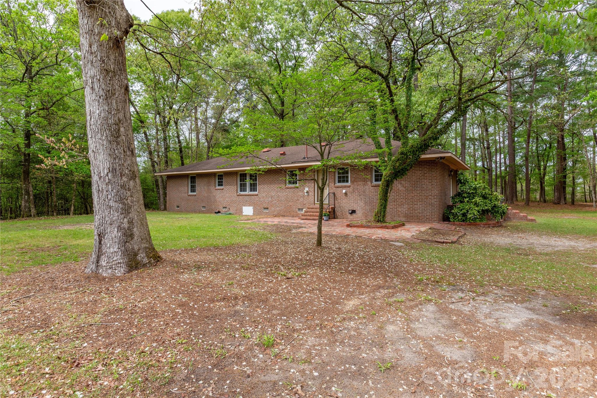 1224 Loop Road Hookerton, NC 28538 - Photo 39 of 47 a view of a house with a yard and large tree