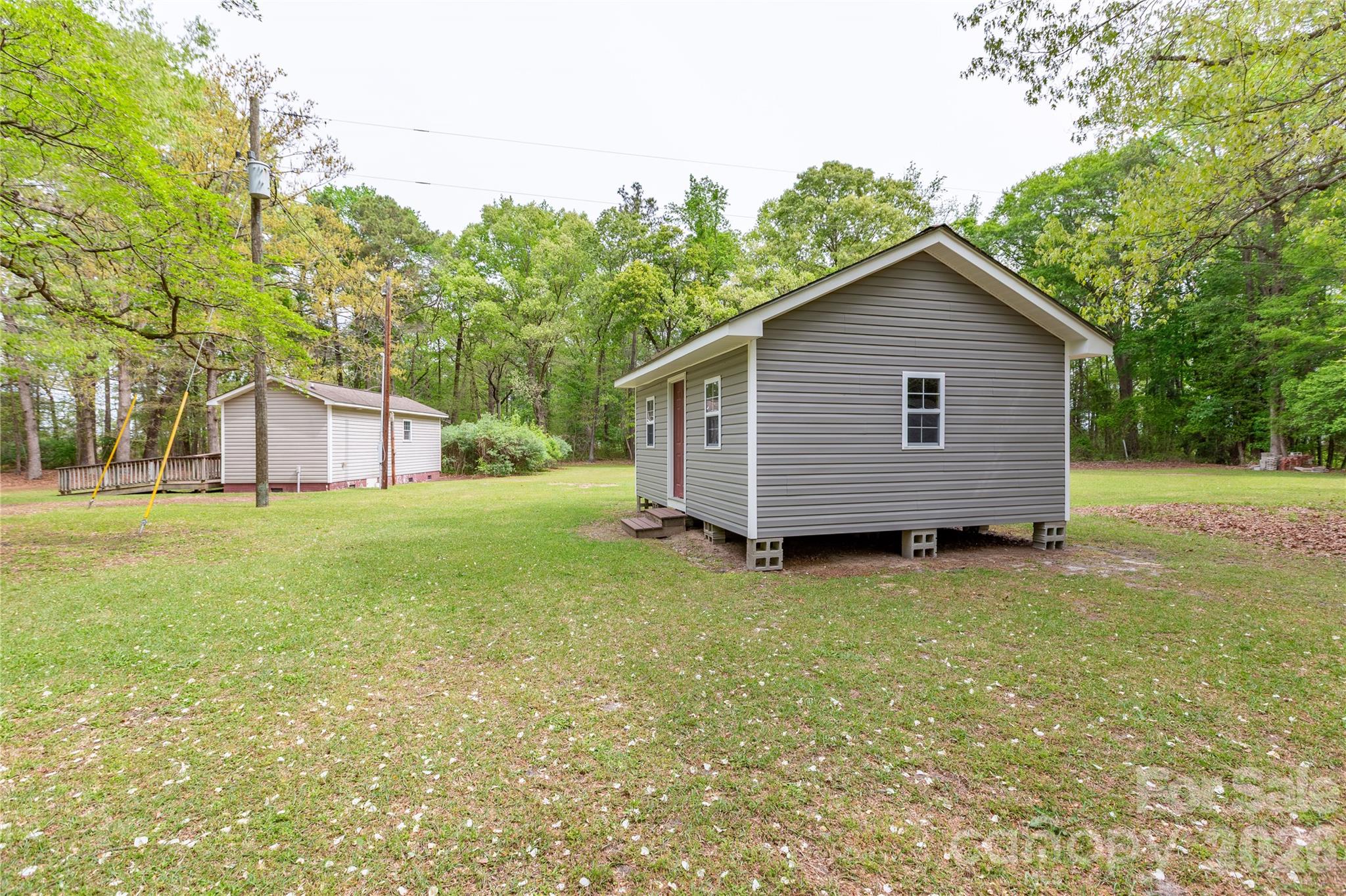 1224 Loop Road Hookerton, NC 28538 - Photo 40 of 47 a view of a house with a yard