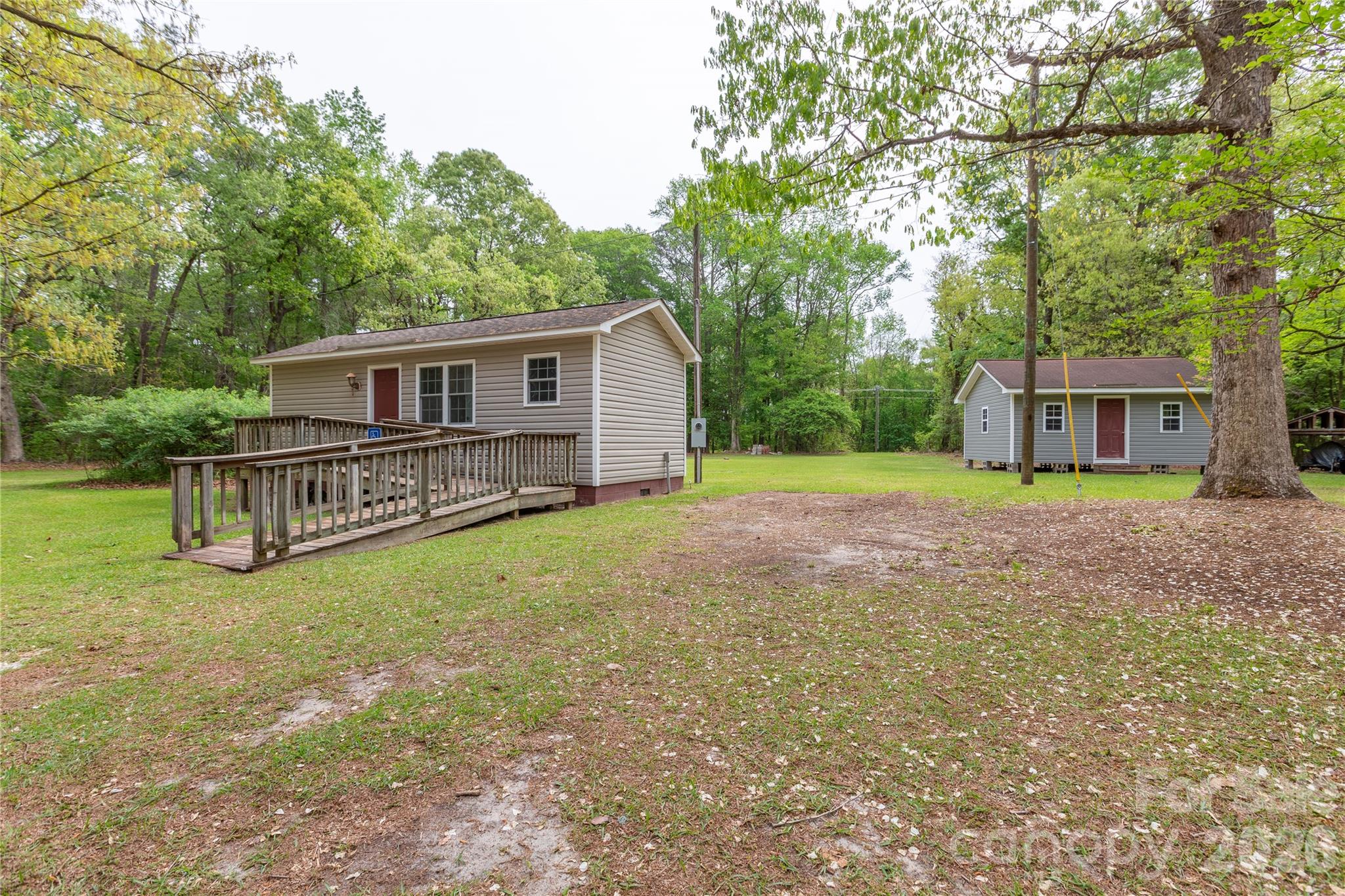 1224 Loop Road Hookerton, NC 28538 - Photo 5 of 47 a view of a house with backyard and sitting area