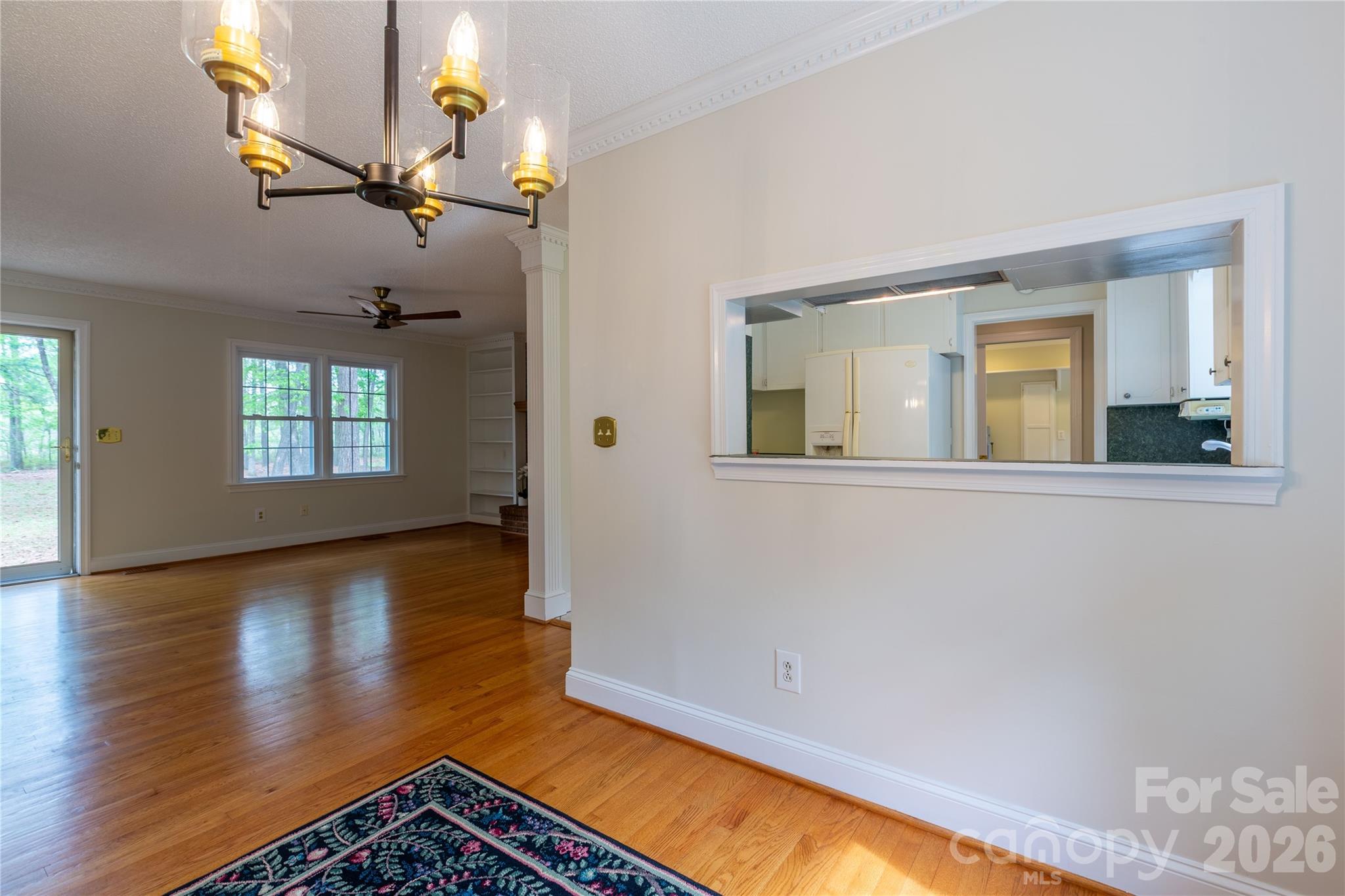 1224 Loop Road Hookerton, NC 28538 - Photo 10 of 47 a view of an empty room with wooden floor and a window