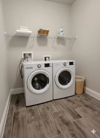 a utility room with dryer and washer