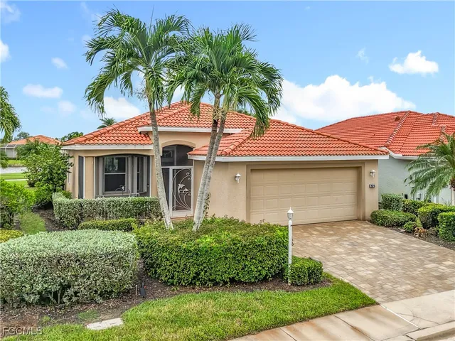 front view of a house with a garden