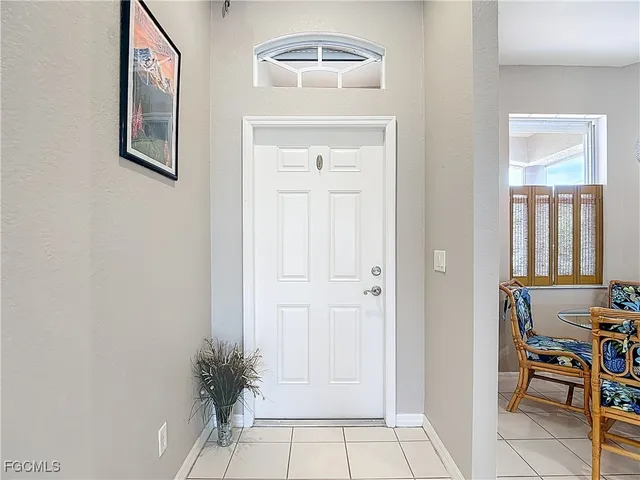 a view of a livingroom with furniture and window