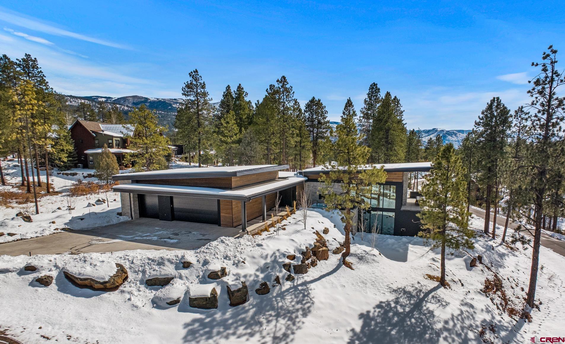 a view of a roof with sitting area