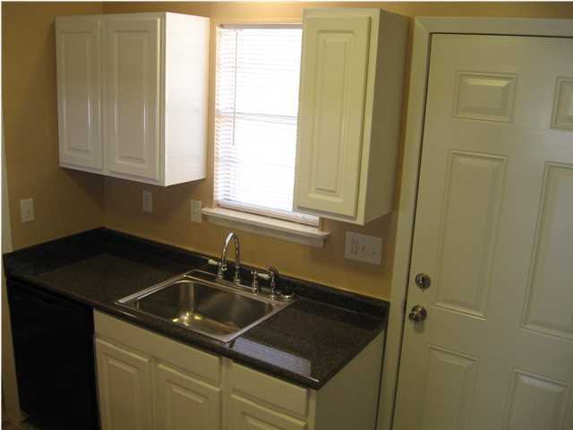 537 Hickory Avenue, Unit B Niceville, FL 32578 - Photo 8 of 19 a kitchen that has a sink and a window