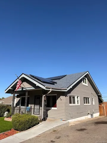 a front view of a house with garage
