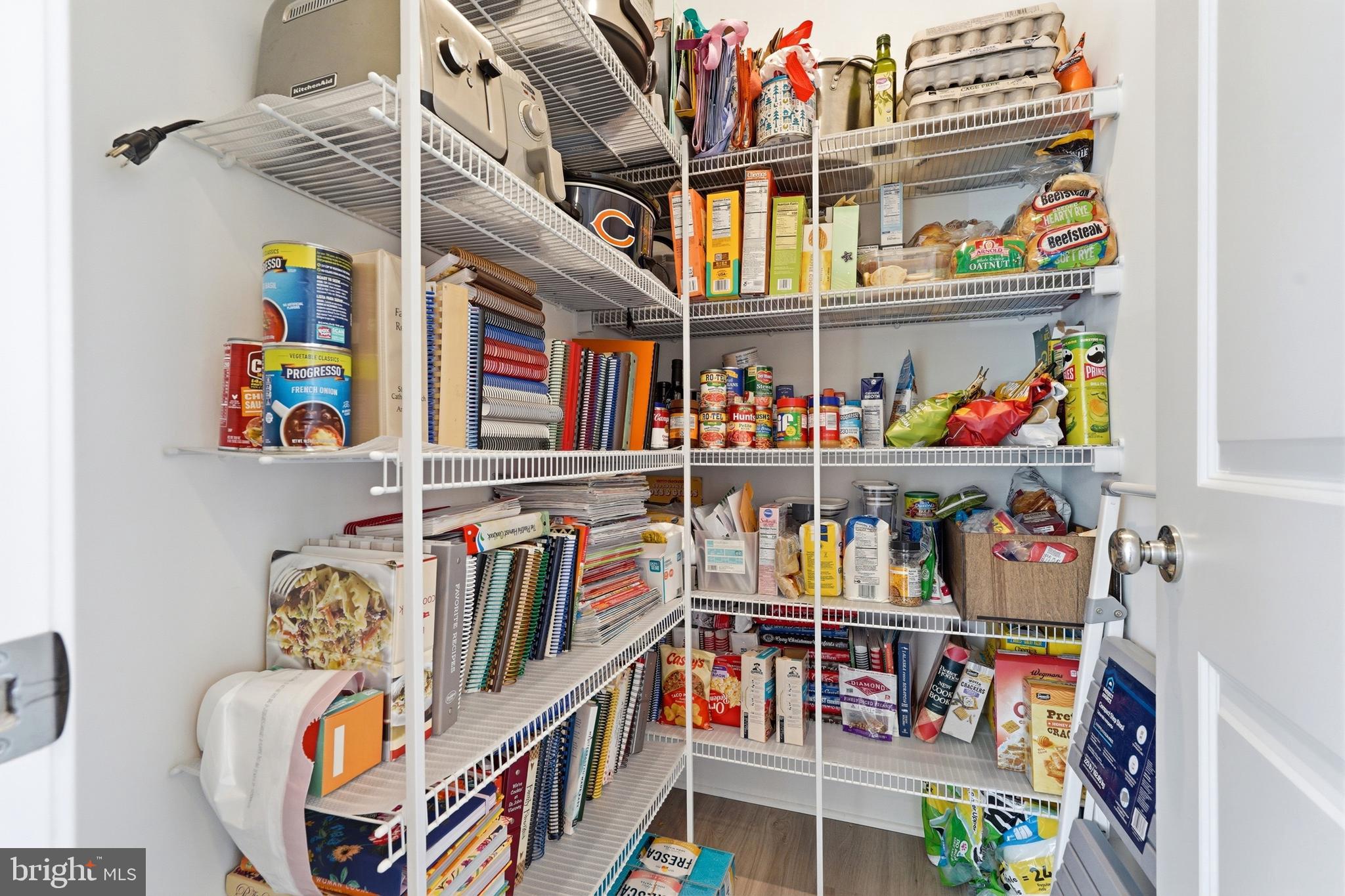 3311 Streamlet Lane Laurel, MD 20724 - Photo 16 of 46 a book store room with lots of clutter and storage
