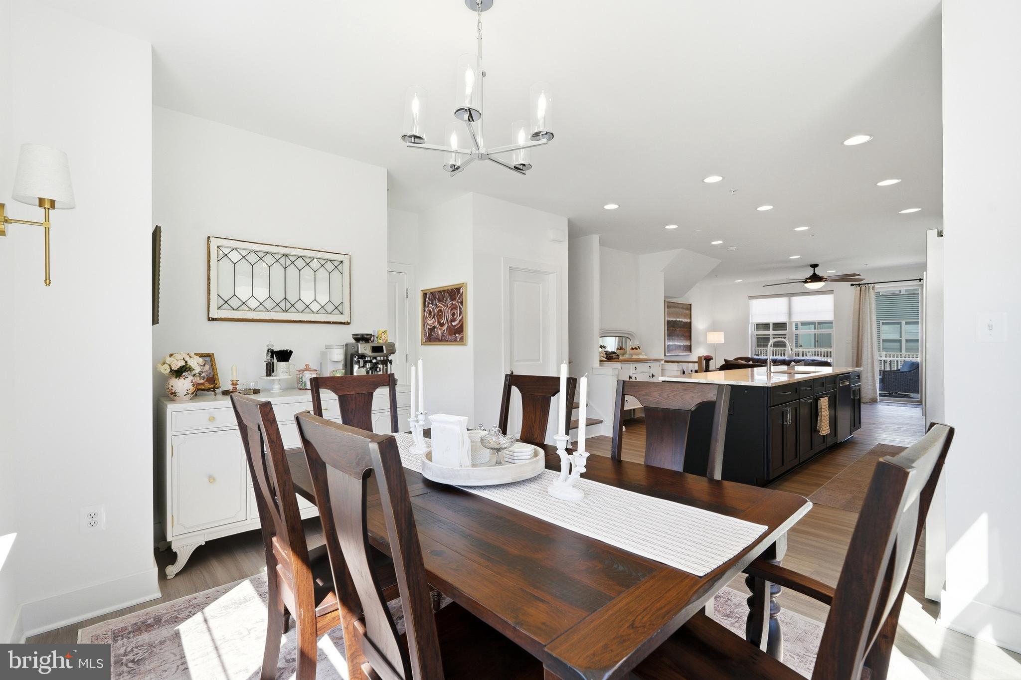 3311 Streamlet Lane Laurel, MD 20724 - Photo 17 of 46 a view of a dining room with furniture and wooden floor