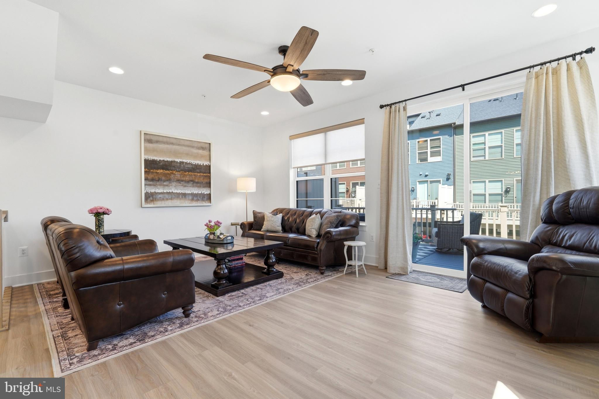 3311 Streamlet Lane Laurel, MD 20724 - Photo 23 of 46 a living room with furniture and a large window