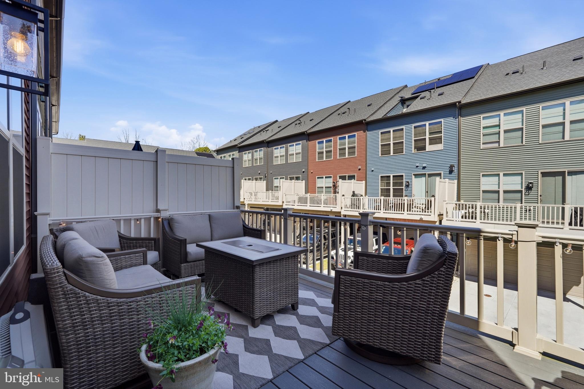 3311 Streamlet Lane Laurel, MD 20724 - Photo 26 of 46 a view of a chairs and table on the deck