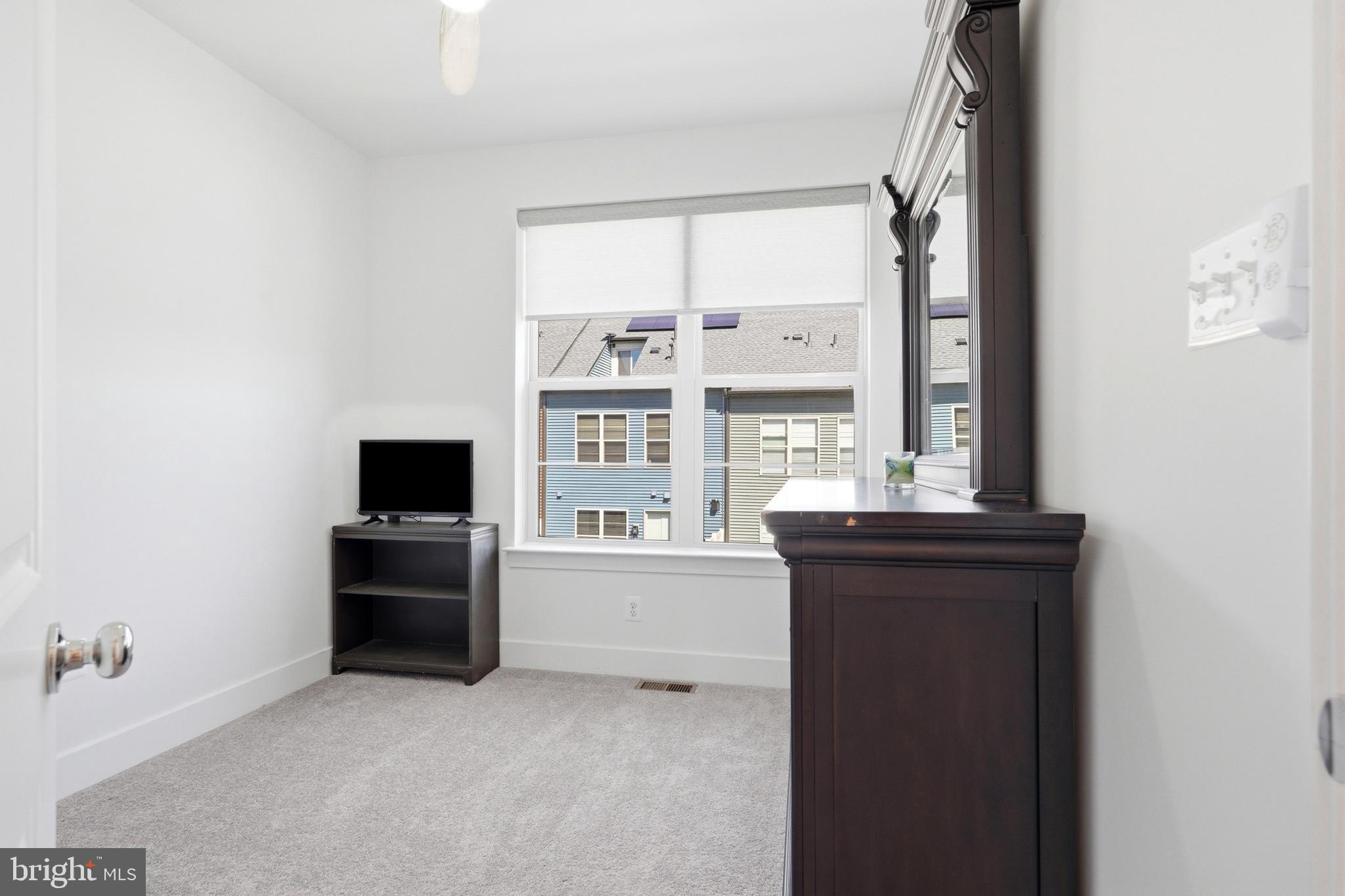 3311 Streamlet Lane Laurel, MD 20724 - Photo 37 of 46 an empty room with a window