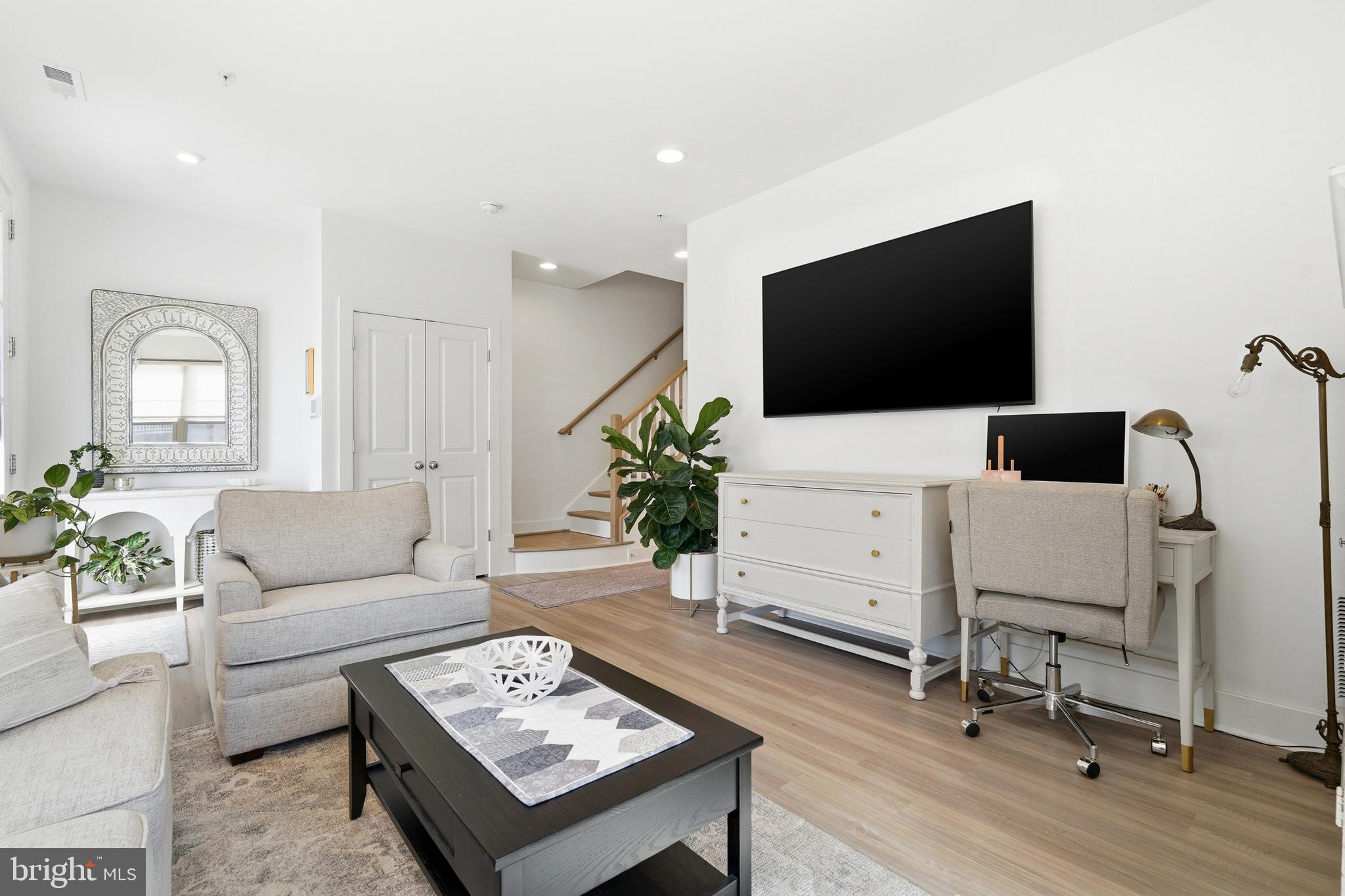 3311 Streamlet Lane Laurel, MD 20724 - Photo 7 of 46 a living room with furniture and a flat screen tv