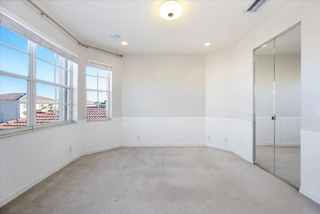 an empty room with windows