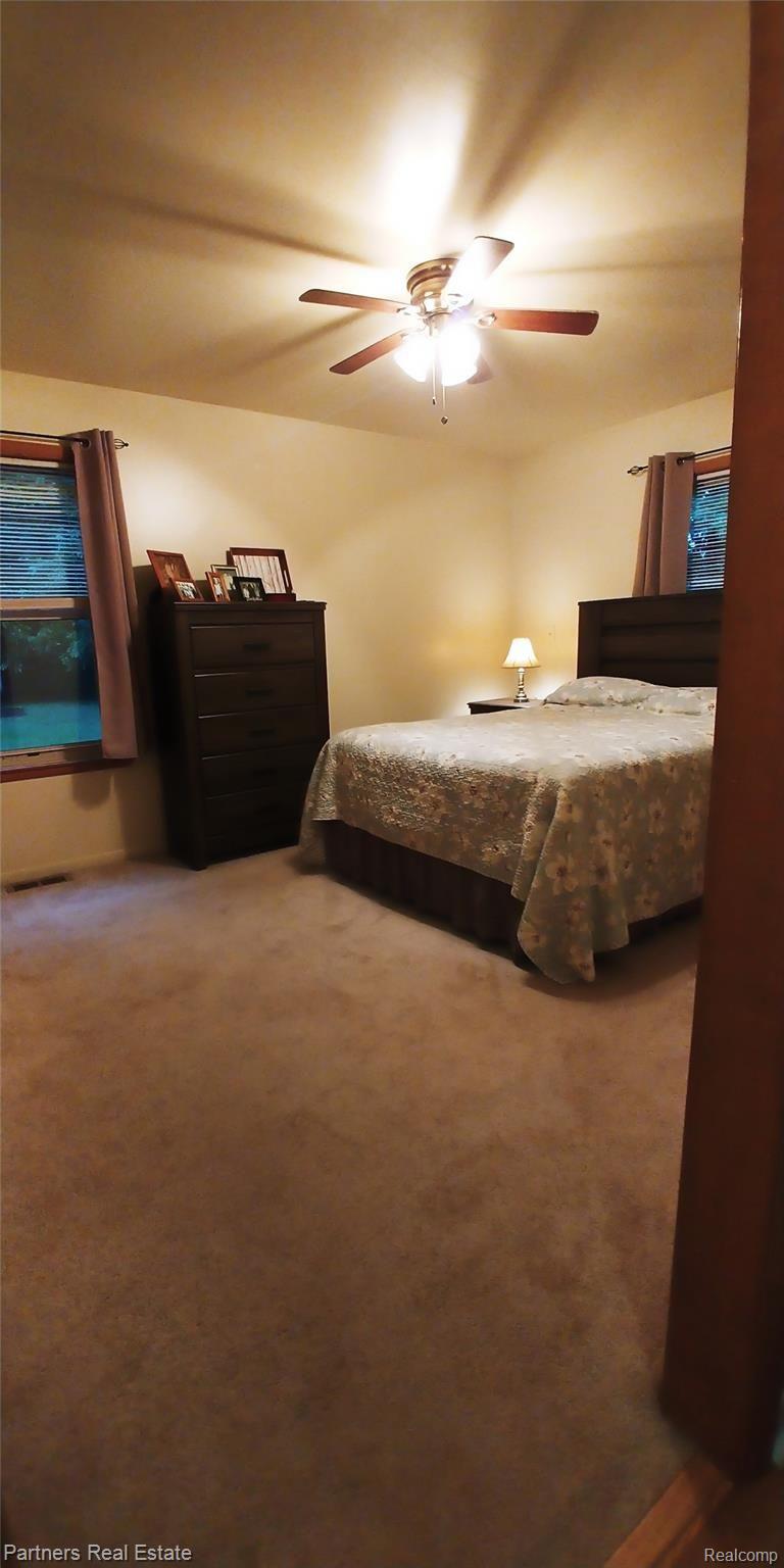 7451 Sanford Road Howell, MI 48855 - Photo 23 of 30 Large bedroom with plenty of closet space...