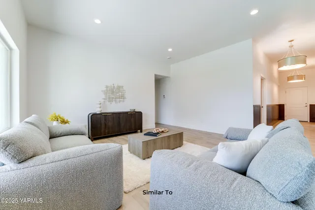 a bedroom with furniture and a couch