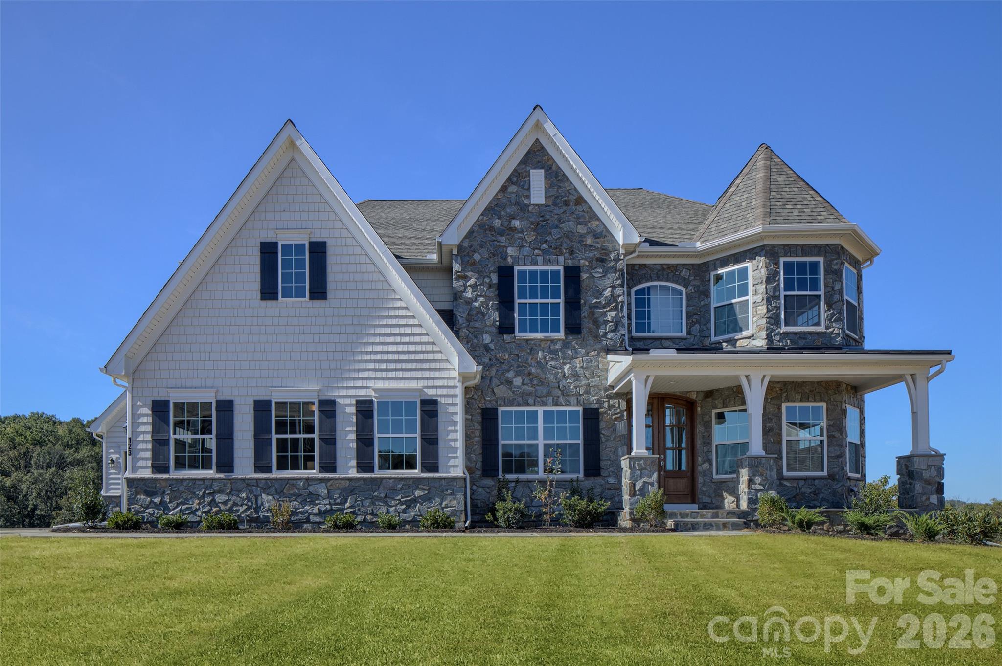 200 Ervin Road, Unit DEVONSHIRE Mooresville, NC 28117 - Photo 11 of 46 a front view of a house with a yard