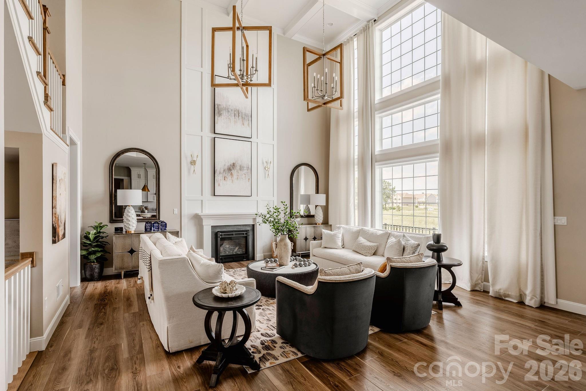 200 Ervin Road, Unit DEVONSHIRE Mooresville, NC 28117 - Photo 25 of 46 a living room with fireplace furniture and a large window