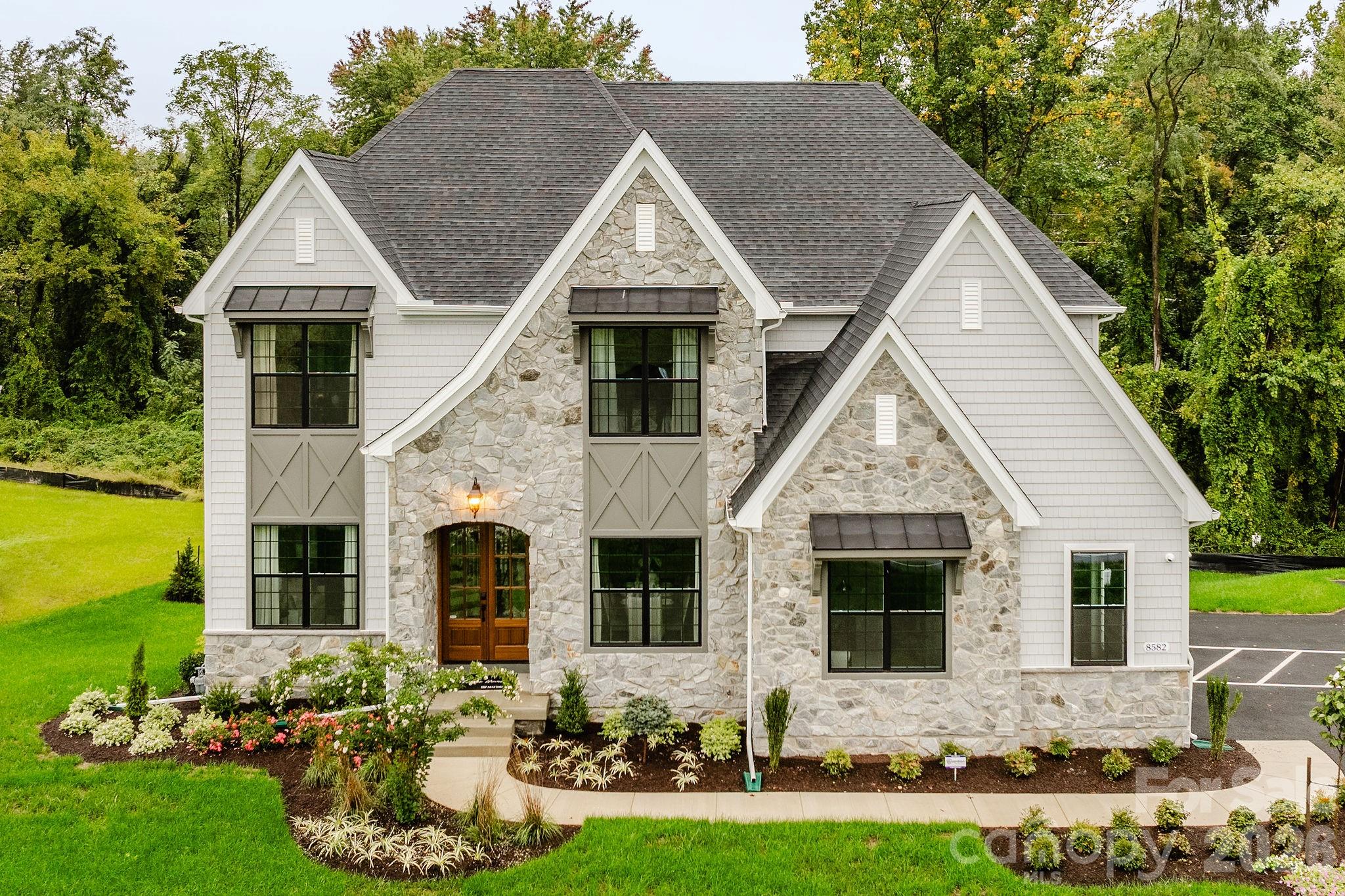 200 Ervin Road, Unit DEVONSHIRE Mooresville, NC 28117 - Photo 5 of 46 a front view of house with yard and green space