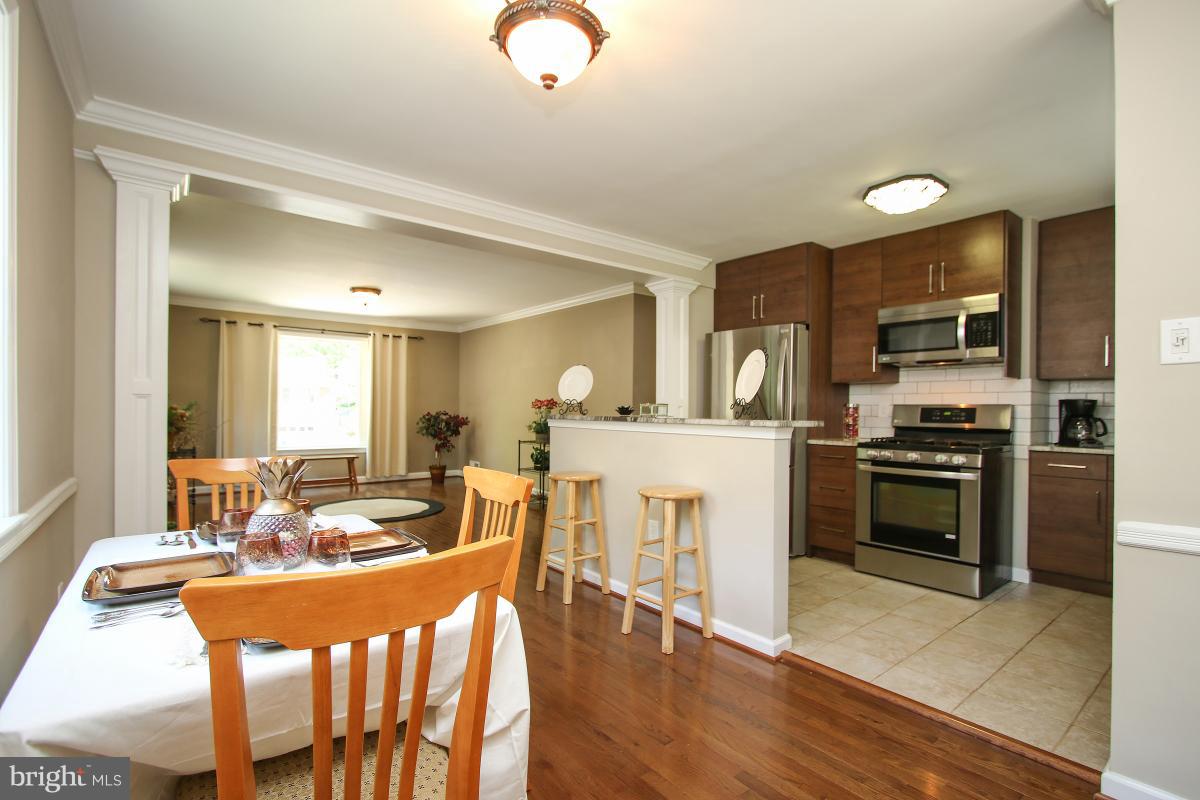 4043 Adams Drive Silver Spring, MD 20902 - Photo 8 of 30 Kitchen opens to dining room