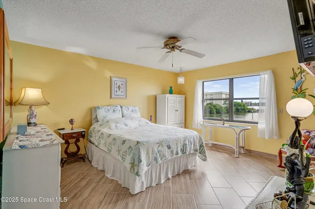 $365,000 | 3611 South Banana River Boulevard, Unit C203, Cocoa Beach, FL 32931