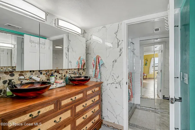 $365,000 | 3611 South Banana River Boulevard, Unit C203, Cocoa Beach, FL 32931