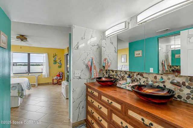 $365,000 | 3611 South Banana River Boulevard, Unit C203, Cocoa Beach, FL 32931