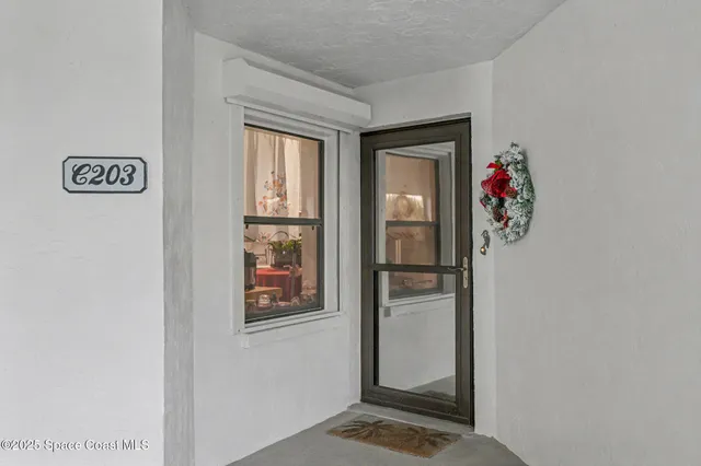 $365,000 | 3611 South Banana River Boulevard, Unit C203, Cocoa Beach, FL 32931