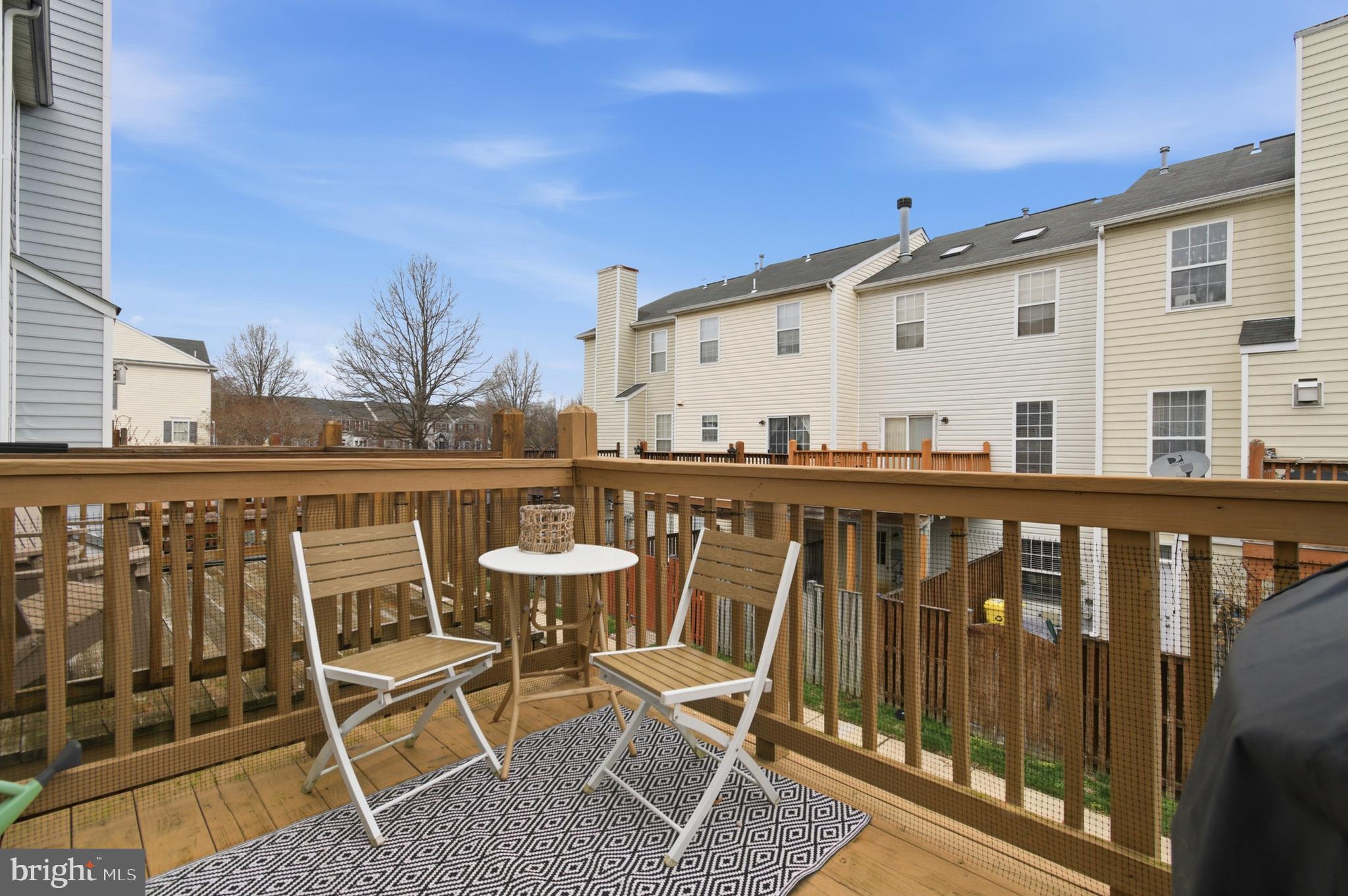 1212 Needham Court Crofton, MD 21114 - Photo 28 of 47 a view of a patio with a table and chairs