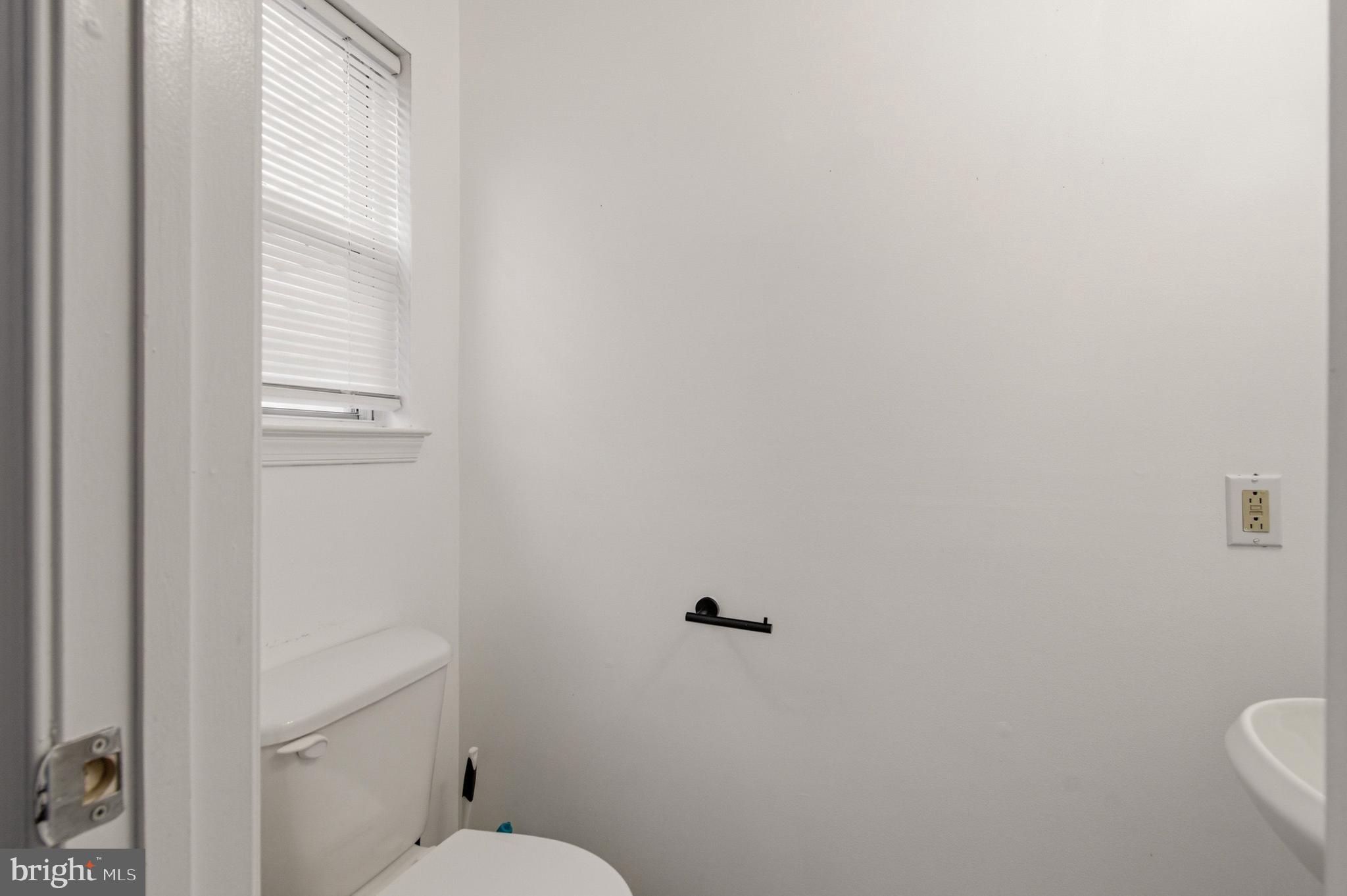 1212 Needham Court Crofton, MD 21114 - Photo 30 of 47 a bathroom with a toilet