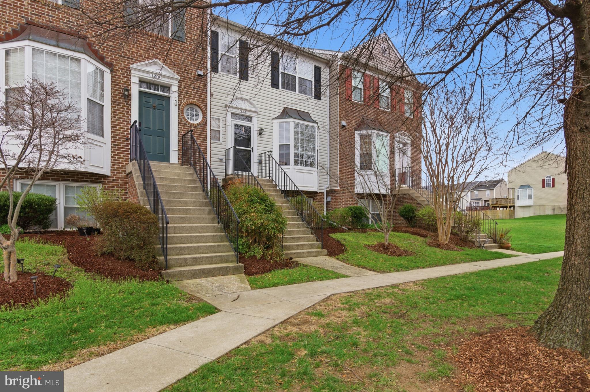 1212 Needham Court Crofton, MD 21114 - Photo 3 of 47 a view of a building with a yard