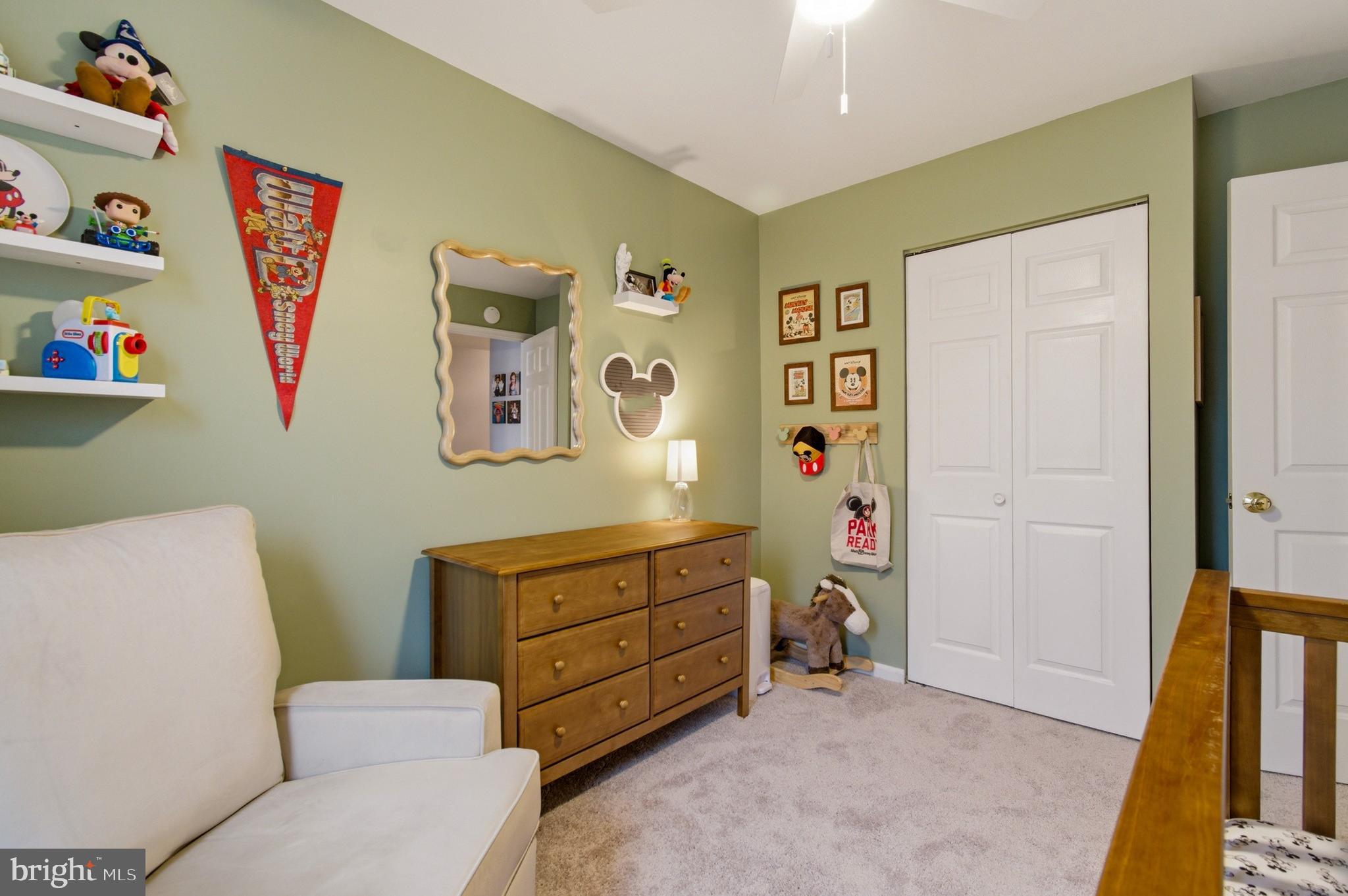 1212 Needham Court Crofton, MD 21114 - Photo 39 of 47 a living room with furniture and a baby crib