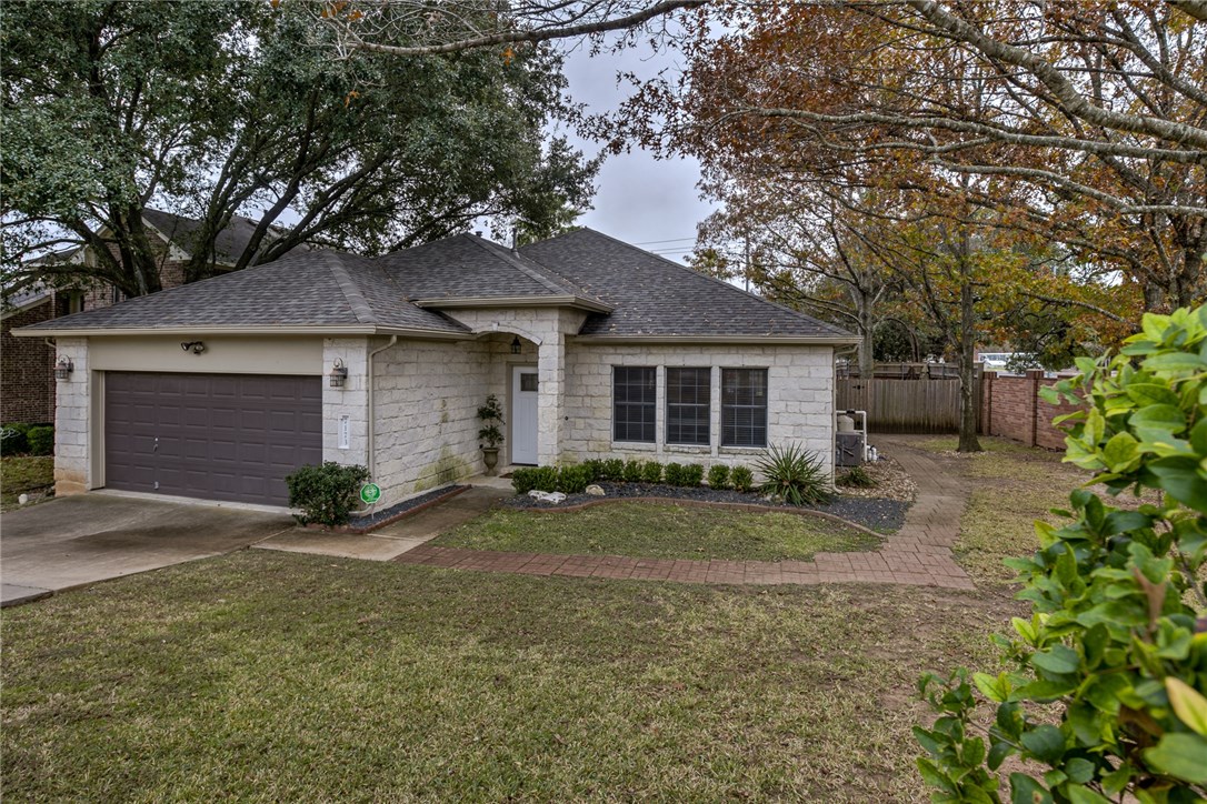 7173 Ridge Oak Road Austin, TX 78749 - Photo 1 of 1 a view of a house with a yard and large tree