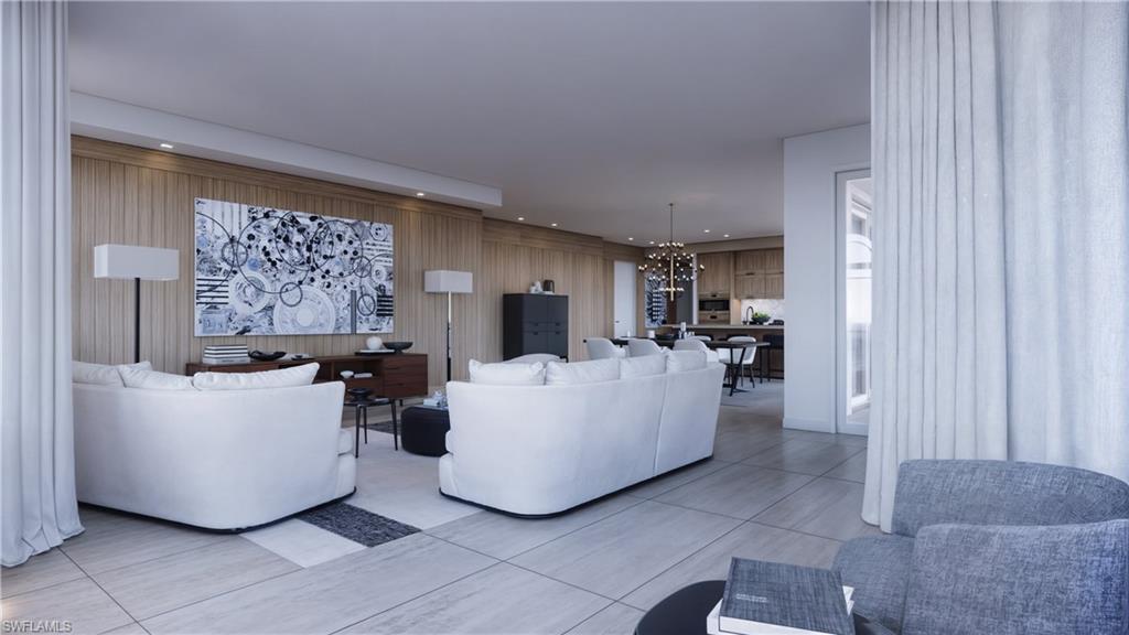 1301 3rd Avenue South, Unit PHW Naples, FL 34102 - Photo 15 of 29 a living room with a couch and a flat screen tv
