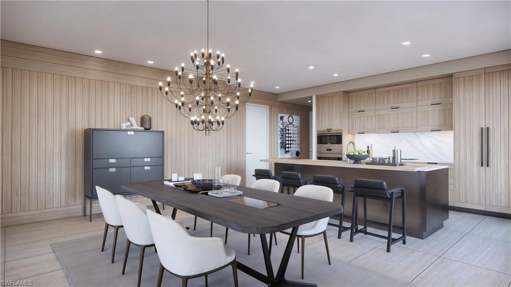 1301 3rd Avenue South, Unit PHW Naples, FL 34102 - Photo 17 of 29 a view of a dining room with furniture and chandelier
