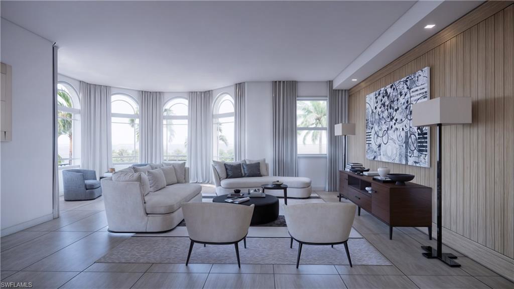 1301 3rd Avenue South, Unit PHW Naples, FL 34102 - Photo 20 of 29 a living room with furniture and a large window