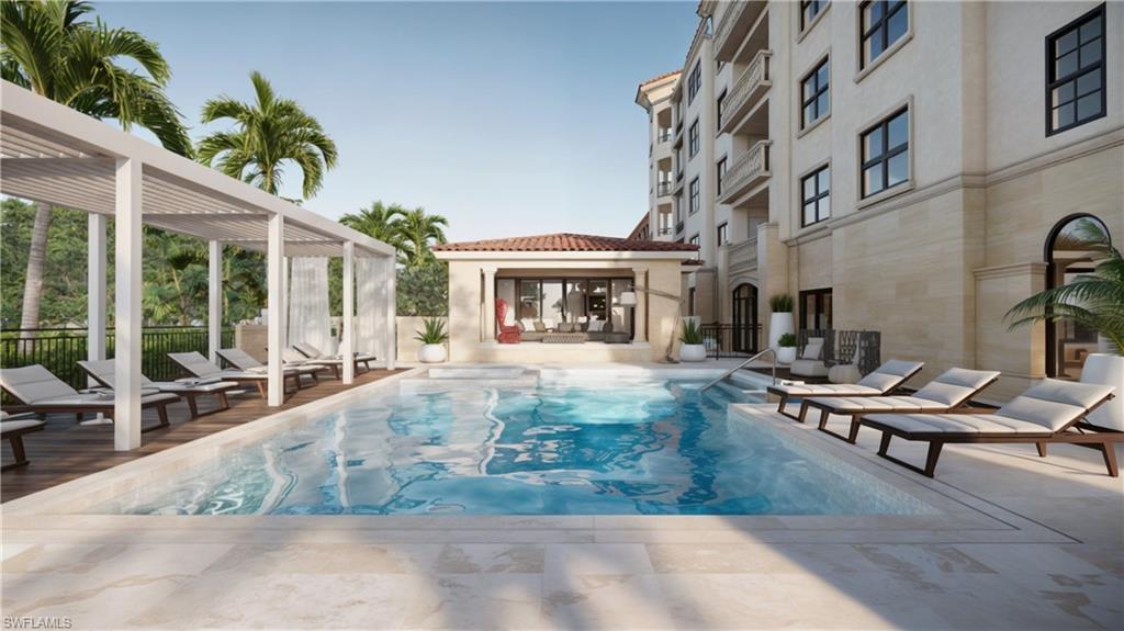 1301 3rd Avenue South, Unit PHW Naples, FL 34102 - Photo 23 of 29 a view of a building with sitting area