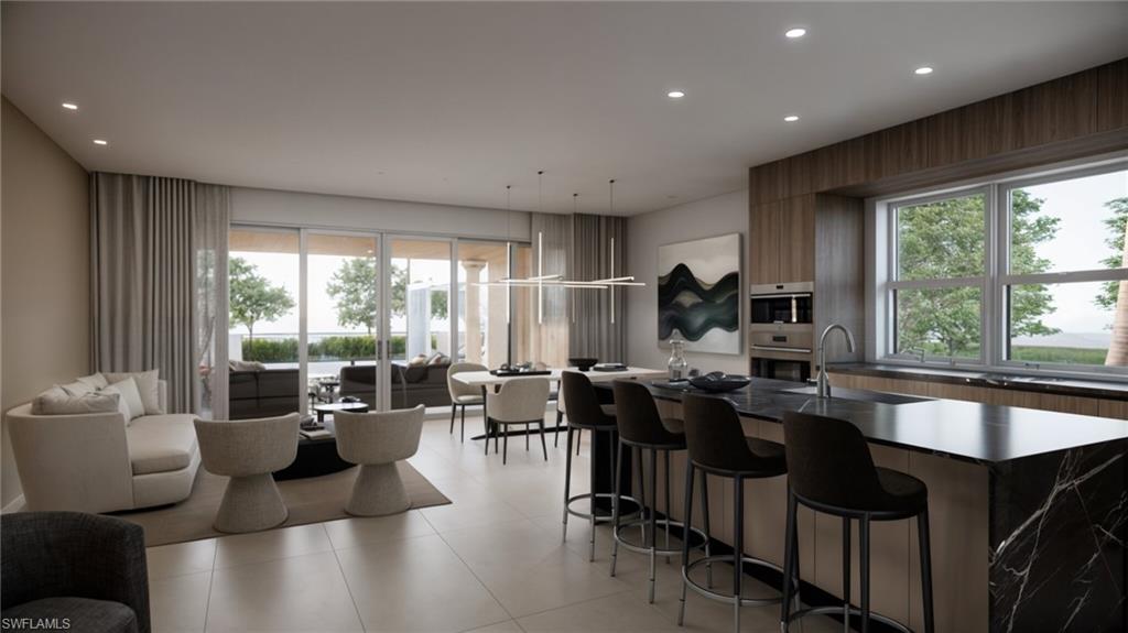 1301 3rd Avenue South, Unit PHW Naples, FL 34102 - Photo 28 of 29 a very nice looking living room with a large window and dining table