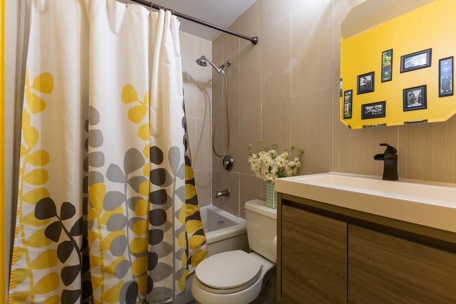 100 Ralph Avenue, Unit 2L Brooklyn, NY 11221 - Photo 8 of 15 a bathroom with a sink and a toilet