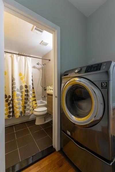 100 Ralph Avenue, Unit 2L Brooklyn, NY 11221 - Photo 9 of 15 a bathroom with a bathtub and a sink