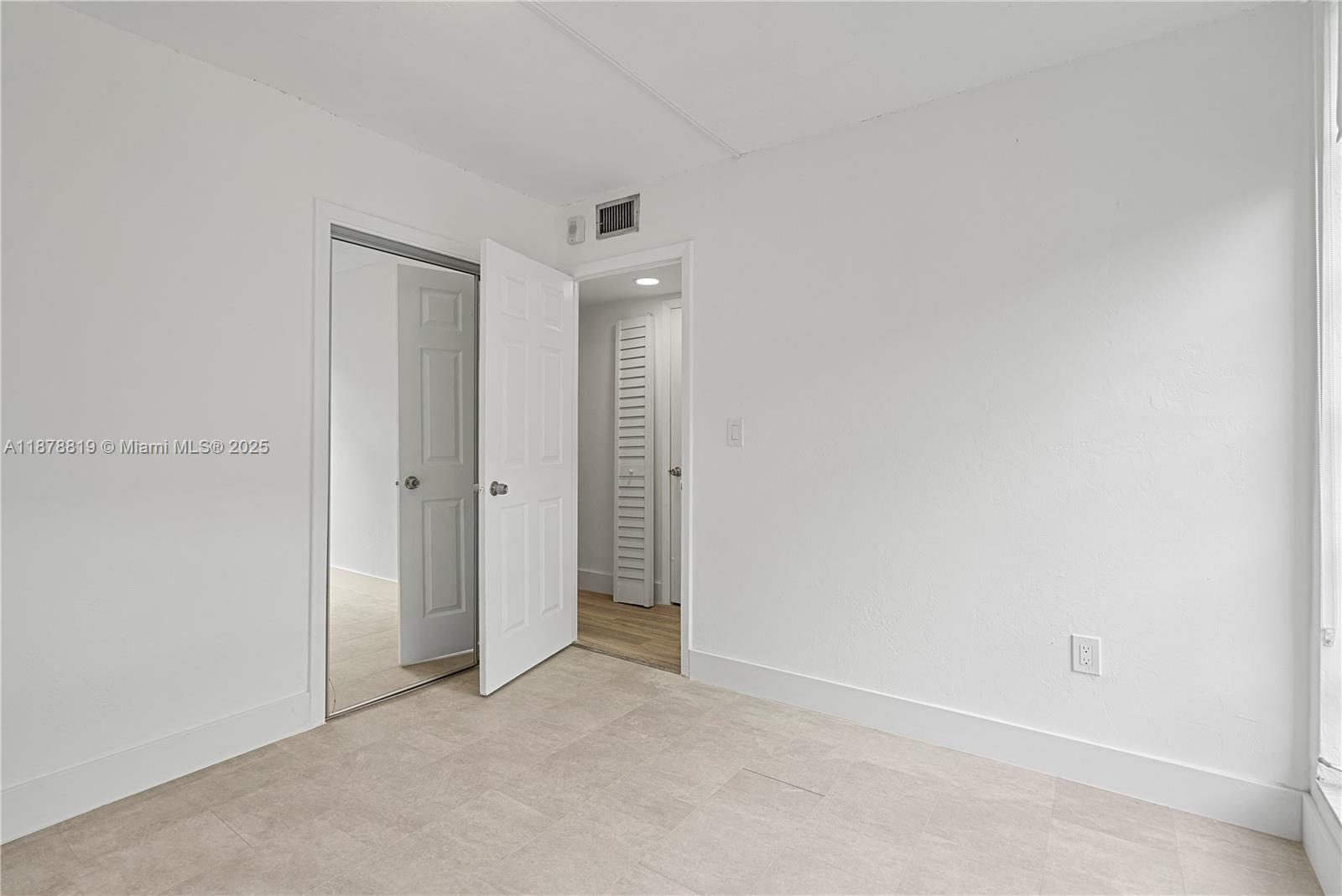 8305 Crespi Boulevard, Unit 2D Miami Beach, FL 33141 - Photo 12 of 33 a view of an empty room