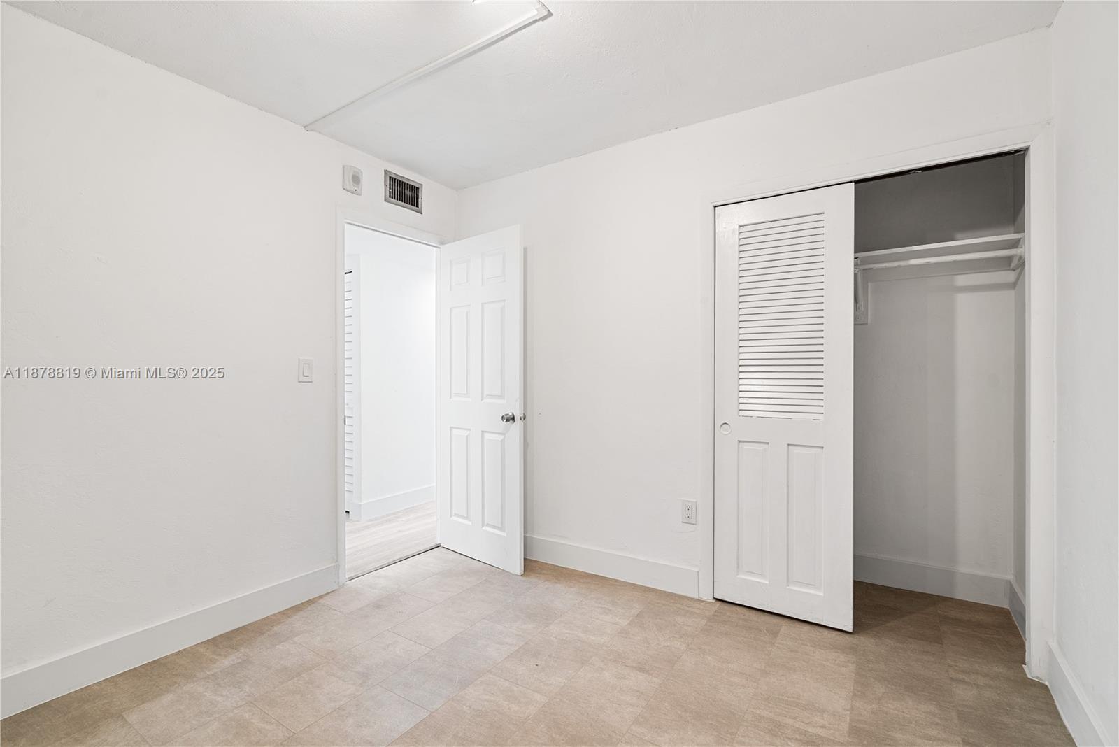 8305 Crespi Boulevard, Unit 2D Miami Beach, FL 33141 - Photo 13 of 33 a view of an empty room