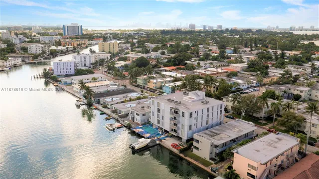 an aerial view of a city with lots of residential buildings