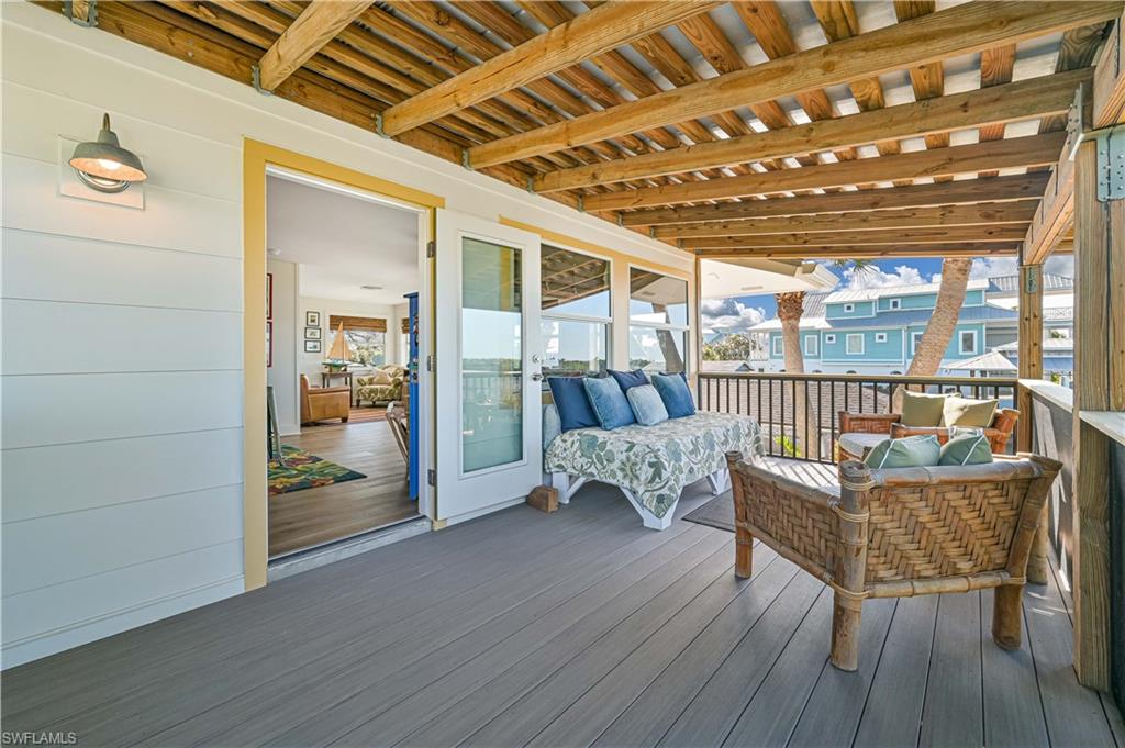 8117 Judge Bean Road Bokeelia, FL 33922 - Photo 11 of 38 Open Lanai and front door