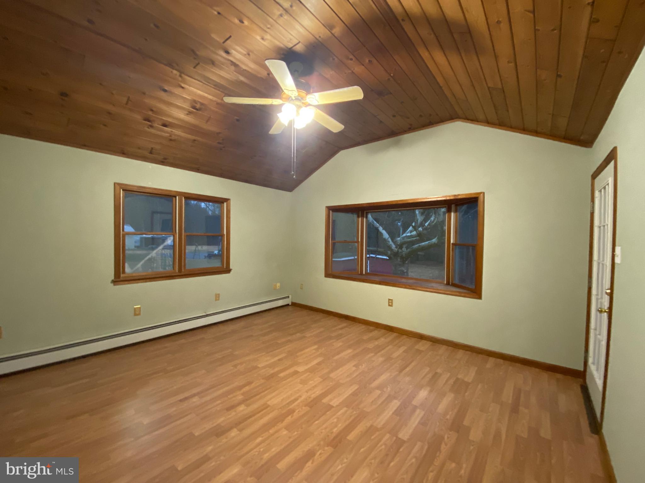 2012 Old Forty Foot Road Harleysville, PA 19438 - Photo 12 of 36 a view of an empty room with window and wooden floor