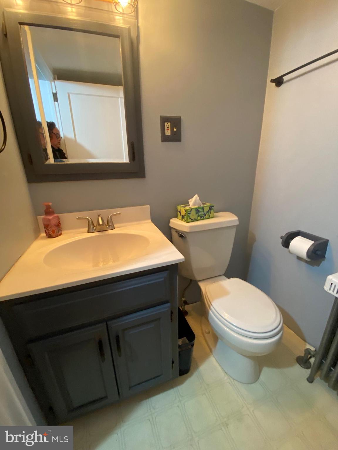 2012 Old Forty Foot Road Harleysville, PA 19438 - Photo 23 of 36 a bathroom with a toilet sink and mirror
